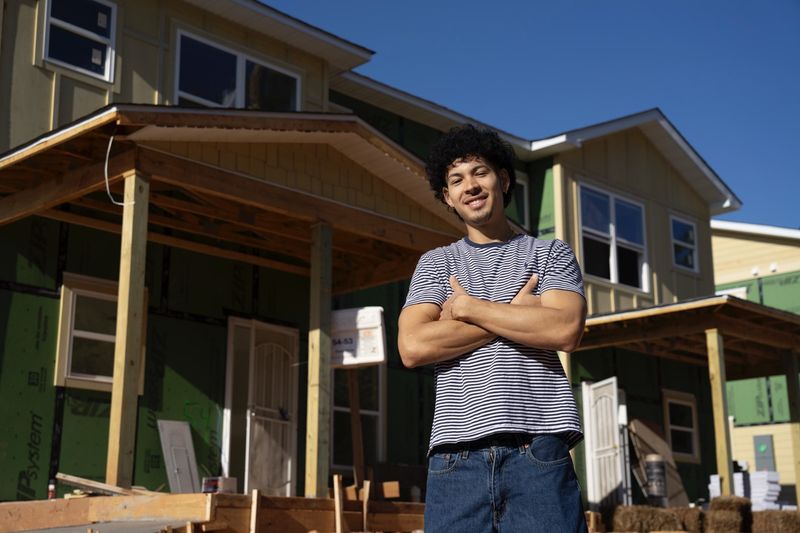 Ozzie, a future Langston Park homeowner, smiling